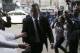 Oscar Pistorius is greetted by fans upon his arrival at the high court in Pretoria, South Africa, Friday, May 9, 2014. Pistorius is charged with murder for the shooting death of his girlfriend, Reeva Steenkamp, on Valentines Day in 2013. (AP Photo/Themba Hadebe)