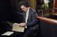 In this Tuesday, April 7, 2009 photo, football draft analyst Mel Kiper Jr prepares for a taping at the ESPN Zone in Baltimore. Saturday marks the 25th anniversary of Kiper's 1984 debut on ESPN's draft coverage, and while his demeanor and hair haven't changed all that much, his popularity certainly has. (AP Photo/Gail Burton)