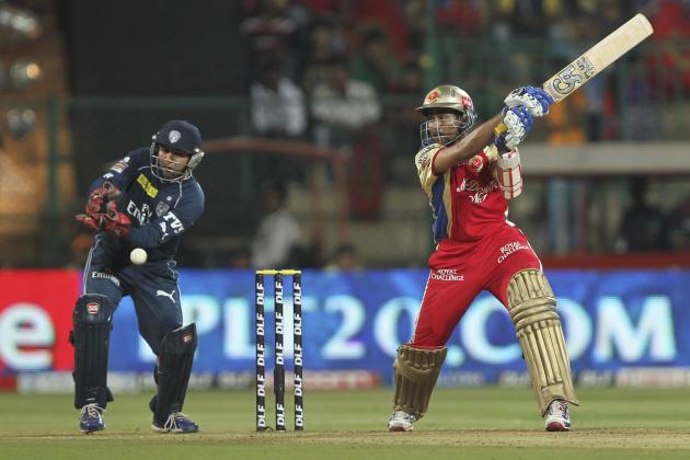 Royal Challengers Bangalore batsman Tilakaratne Dilshan plays a shot against Deccan Chargers' during an Indian Premier League (IPL) cricket match in Bangalore, India, Sunday, May 6, 2012. (AP Photo)