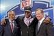 Missouri defensive end Kony Ealy poses for photos with NFL commissioner Roger Goodell and Mark Carrier after being selected as the 60th pick by the Carolina Panthers in the second round of the 2014 NFL Draft, Friday, May 9, 2014, in New York. (AP Photo/Jason DeCrow)