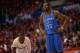 LOS ANGELES, CA - MAY 9: Chris Paul #3 of the Los Angeles Clippers stands on the court during a game against Kevin Durant #35 of the Oklahoma City Thunder look on in Game Three of the Western Conference Semifinals during the 2014 NBA Playoffs at Staples Center on May 9, 2014 in Los Angeles, California. NOTE TO USER: User expressly acknowledges and agrees that, by downloading and/or using this Photograph, user is consenting to the terms and conditions of the Getty Images License Agreement. Mandatory Copyright Notice: Copyright 2014 NBAE (Photo by Noah Graham/NBAE via Getty Images)