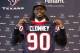 HOUSTON, TX - MAY 09: Jadeveon Clowney displays his Houston Texans jersey as he is introduced at Reliant Stadium on May 9, 2014 in Houston, Texas. Clowney was selected by the Texans with the first overall pick in the 2014 NFL draft. (Photo by Bob Levey/Getty Images)