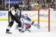 PITTSBURGH, PA - MAY 9: Evgeni Malkin #71 of the Pittsburgh Penguins catches the puck on the rebound off his own shot before turning around and scoring on a second shot on goaltender Henrik Lundqvist #30 of the New York Rangers in the second period in Game Five of the Second Round of the 2014 NHL Stanley Cup Playoffs on May 9, 2014 at CONSOL Energy Center in Pittsburgh, Pennsylvania. (Photo by Jamie Sabau/Getty Images)
