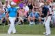 PONTE VEDRA BEACH, FL - MAY 10: Jordan Spieth of the United States (R) saves par on the 18th hole as Martin Kaymer of Germany look on during the third round of THE PLAYERS Championship on the stadium course at TPC Sawgrass on May 10, 2014 in Ponte Vedra Beach, Florida. (Photo by Kevin C. Cox/Getty Images)