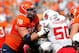 Oct 5, 2013; Charlottesville, VA, USA; Virginia Cavaliers offensive linesman Luke Bowanko (70) blocks Ball State Cardinals linebacker Trent Toothman (50) at Scott Stadium. Mandatory Credit: Geoff Burke-USA TODAY Sports