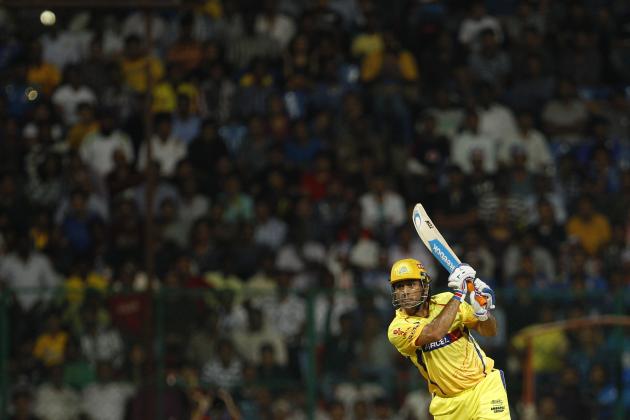 Chennai Super Kings' captain Mahendra Singh Dhoni plays a shot during their Indian Premier League (IPL) playoff cricket match against Mumbai Indians' in Bangalore, India, Wednesday, May 23, 2012. (AP Photo/Aijaz Rahi)