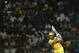 Chennai Super Kings' captain Mahendra Singh Dhoni plays a shot during their Indian Premier League (IPL) playoff cricket match against Mumbai Indians' in Bangalore, India, Wednesday, May 23, 2012. (AP Photo/Aijaz Rahi)