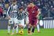 Juventus midfielder Andrea Pirlo, left, challenges the ball with AS Roma forward Francesco Totti during a Serie A soccer match between Juventus and AS Roma at the Juventus stadium, in Turin, Italy, Sunday, Jan. 5, 2014. (AP Photo/Massimo Pinca)