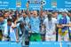 MANCHESTER, ENGLAND - MAY 11: Joe Hart of Manchester City celebrates with his team-mates at the end of the Barclays Premier League match between Manchester City and West Ham United at the Etihad Stadium on May 11, 2014 in Manchester, England. (Photo by Alex Livesey/Getty Images)