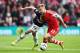 SOUTHAMPTON, ENGLAND - MAY 11: (L-R) Adnan Januzaj of Manchester United and Luke Shaw of Southampton challenge for the ball during the Barclays Premier League match between Southampton and Manchester United at St Mary's Stadium on May 11, 2014 in Southampton, England. (Photo by Ian Walton/Getty Images)