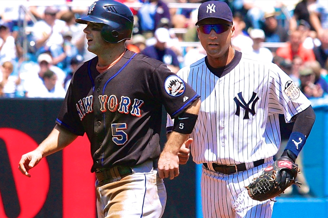 New York Yankees Derek Jeter smiles along side of New York Mets