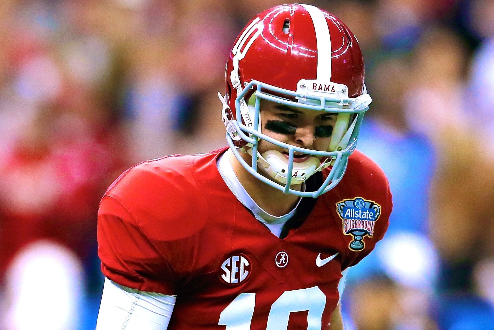 Katherine in an Alabama jersey. A.J. was a quarter back for