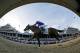 In this image taken with a fisheye lens, jockey Victor Espinoza rides California Chrome to win the 140th running of the Kentucky Derby horse race at Churchill Downs Saturday, May 3, 2014, in Louisville, Ky. (AP Photo/Matt Slocum)