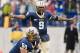 In this photo provided by Montana State, Montana State quarterback Denarius McGhee (9) calls out a play at the line during an NCAA college football game against New Hampshire, Saturday, Dec. 3, 2011, in Bozeman, Mont. Montana State won 26-25. (AP Photo/Montana State University, Kelly Gorham)