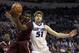 Fordham's Jon Severe, left, grabs a rebound along side Saint Louis' Rob Loe during the second half of an NCAA college basketball game Saturday, Jan. 18, 2014, in St. Louis. Saint Louis won 70-48. (AP Photo/Jeff Roberson)