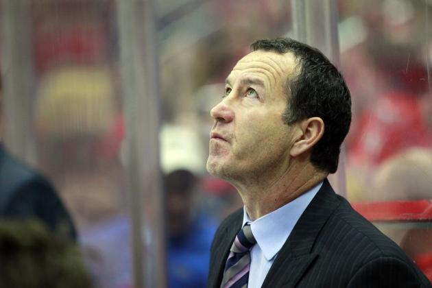 Feb 9, 2013; Washington, DC, USA;  Florida Panthers head coach Kevin Dineen looks up at the scoreboard form behind the bench against the Washington Capitals in the first period at Verizon Center. The Capitals won 5-0. Mandatory Credit: Geoff Burke-USA TODAY Sports