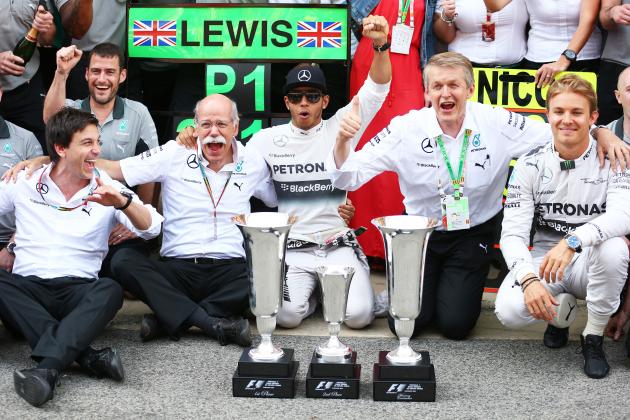 MONTMELO, SPAIN - MAY 11:  Lewis Hamilton of Great Britain and Mercedes GP celebrates his victory with team-mate Nico Rosberg of Germany and Mercedes GP, Mercedes GP Executive Director Toto Wolff (L) and the rest of the team after the Spanish Formula One Grand Prix at Circuit de Catalunya on May 11, 2014 in Montmelo, Spain.  (Photo by Mark Thompson/Getty Images)