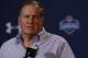 New England Patriots head coach Bill Belichick answers a question during a news conference at the NFL football scouting combine in Indianapolis, Thursday, Feb. 20, 2014. (AP Photo/Michael Conroy)