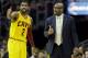 Cleveland Cavaliers' Kyrie Irving (2) talks with head coach Mike Brown in an NBA basketball game against the Charlotte Bobcats Saturday, April 5, 2014, in Cleveland. (AP Photo/Mark Duncan)