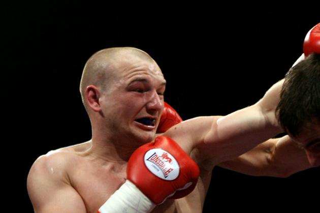 CARDIFF, WALES - MARCH 22:  Gavin Rees of Wales (L) in action during the WBA light-welterweight fight between Gavin Rees and Andreas Kotelnik on March 22, 2008 at the Cardiff International Arena in Cardiff, Wales. (Photo by John Gichigi/Getty Images)