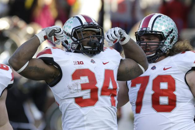 Ohio State running back Carlos Hyde (34) reacts after his touchdown during the second half of an NCAA college football game against Michigan in Ann Arbor, Mich., Saturday, Nov. 30, 2013. Ohio State defeated Michigan 42-41. (AP Photo/Carlos Osorio)