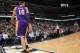Los Angeles Lakers center Pau Gasol, of Spain, looks over his shoulder as he walks off court to lockerroom after suffering an injury against the Denver Nuggets in the first quarter of an NBA basketball game in Denver on Friday, March 7, 2014. (AP Photo/David Zalubowski)