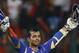 Rajasthan Royals batsman Ajinkya Rahane raises his bat and helmet to celebrate scoring a century during their Indian Premier League (IPL) cricket match against Royal Challengers Bangalore in Bangalore, India, Sunday, April 15, 2012. (AP Photo/Aijaz Rahi)