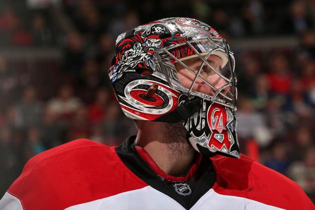 OTTAWA, ON - MARCH 31: Cam Ward #30 of the Carolina Hurricanes looks on during a stoppage in play against the Ottawa Senators at Canadian Tire Centre on March 31, 2014 in Ottawa, Ontario, Canada.  (Photo by Andre Ringuette/NHLI via Getty Images)