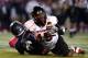 TOLEDO, OH - NOVEMBER 20: Jimmie Ward #15 of the Northern Illinois Huskies intercepts a pass intended for Alonzo Russell #9 of the Toledo Rockets during the first quarter on November 20, 2013 at the Glass Bowl in Toledo, Ohio. (Photo by Kirk Irwin/Getty Images)