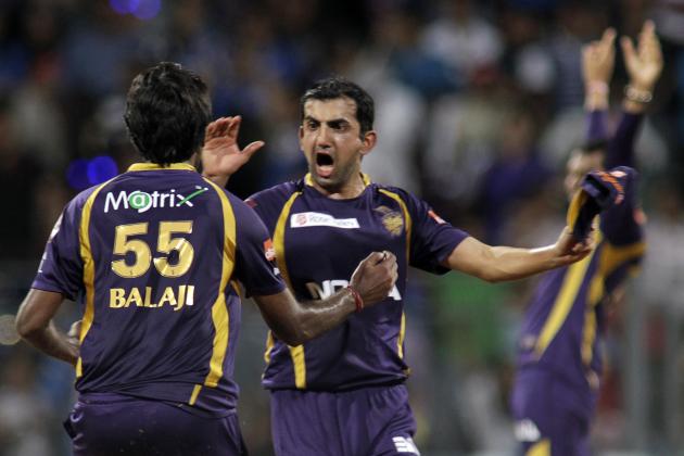 Kolkata Knight Riders' Gautam Gambhir, right,  and L. Balaji celebrates after their team won the match against Mumbai Indians during the Indian Premier League (IPL) cricket match in Mumbai, India, Wednesday, May 16, 2012. (AP Photo/ Rajanish Kakade)
