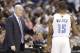 Charlotte Bobcats head coach Steve Clifford, left, talks with Kemba Walker, right, during the second half in Game 4 of an opening-round NBA basketball playoff series against the Miami Heat in Charlotte, N.C., Monday, April 28, 2014. The Heat won 109-98. (AP Photo/Chuck Burton)