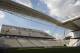 Men work on the Itaquerao stadium in Sao Paulo, Brazil, Thursday, May 8, 2014. The still unfinished stadium will host the World Cup opener match between Brazil and Croatia on June 12. (AP Photo/Andre Penner)