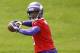 Quarterback Teddy Bridgewater drops back to pass during Minnesota Vikings minicamp in Eden Prairie, Minn., Friday, May 16, 2014. New Vikings coach Mike Zimmer set to work getting young players like Bridgewater, linebacker Anthony Barr and defensive backs Antone Exum and Kendall James up to speed on what will be expected of them in the NFL. (AP Photo/Ann Heisenfelt)