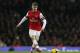 Arsenal's Aaron Ramsey plays against Hull City during their English Premier League soccer match at Emirates Stadium in London, Wednesday, Dec. 4, 2013. (AP Photo/Sang Tan)