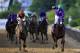 BALTIMORE, MD - MAY 17: California Chrome #3, ridden by Victor Espinoza, crosses the finishline to win the 139th running of the Preakness Stakes at Pimlico Race Course on May 17, 2014 in Baltimore, Maryland. (Photo by Rob Carr/Getty Images)