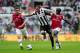 NEWCASTLE UPON TYNE, ENGLAND - MAY 19: Jonas Gutierrez of Newcastle in action against Bacary Sagna (L) and Aaron Ramsey of Arsenal during the Barclays Premier League match between Newcastle United and Arsenal at St James' Park on May 19, 2013 in Newcastle upon Tyne, England. (Photo by Stu Forster/Getty Images)