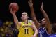 INDIANAPOLIS, IN - MARCH 30: Nik Stauskas #11 of the Michigan Wolverines shoots the ball against Aaron Harrison #2 of the Kentucky Wildcats during the midwest regional final of the 2014 NCAA Men's Basketball Tournament at Lucas Oil Stadium on March 30, 2014 in Indianapolis, Indiana. (Photo by Jonathan Daniel/Getty Images)