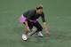 INDIAN WELLS, CA - MARCH 07: Victoria Azarenka of Belarus winces in pain after returning a shot to Lauren Davis during the BNP Paribas Open at Indian Wells Tennis Garden on March 7, 2014 in Indian Wells, California. (Photo by Jeff Gross/Getty Images)