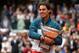 PARIS, FRANCE - JUNE 09: Rafael Nadal of Spain poses with the Coupe des Mousquetaires trophy as he celebrates victory in the men's singles final against David Ferrer of Spain during day fifteen of the French Open at Roland Garros on June 9, 2013 in Paris, France. (Photo by Matthew Stockman/Getty Images)