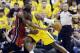 Indiana Pacers center Roy Hibbert (55) drives against Miami Heat center Chris Bosh during the first half of Game 1 of the Eastern Conference finals NBA basketball playoff series, Sunday, May 18, 2014, in Indianapolis. (AP Photo/Darron Cummings)