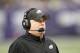 Philadelphia Eagles head coach Chip Kelly stands on the sidelines during the first half of an NFL football game against the Minnesota Vikings, Sunday, Dec. 15, 2013, in Minneapolis. (AP Photo/Andy King)