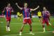 Bayern's Thomas Mueller, center, celebrates scoring his side's second goal during the German Soccer Cup Final between FC Bayern Munich and Borussia Dortmund at the Olympic Stadium in Berlin, Germany, Saturday, May 17, 2014. (AP Photo/Gero Breloer)