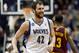 Minnesota Timberwolves' Kevin Love smiles after a three-point shot in the second half of an NBA basketball game against the Cleveland Cavaliers, Wednesday, Nov. 13, 2013, in Minneapolis. Love led the Timberwolves with 33 points in the team's 124-95 win. (AP Photo/Jim Mone)