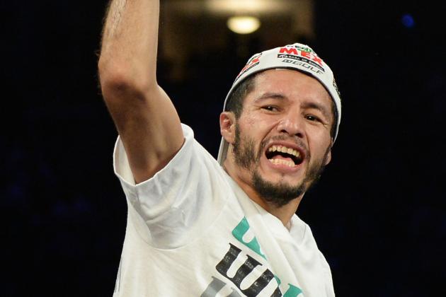 CARSON, CA - AUGUST 24:  Jhonny Gonzalez celebrates his first round knockout of Abner Mares during the WBC Featherweight Title Fight at the StubHub Center on August 24, 2013 in Carson, California.  (Photo by Harry How/Getty Images)