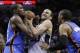 San Antonio Spurs' Manu Ginobili, center, tries to drive between Oklahoma City Thunder's Kevin Durant, left, and Russell Westbrook during the first half of Game 2 of the Western Conference finals NBA basketball playoff series, Wednesday, May 21, 2014, in San Antonio. (AP Photo/Eric Gay)