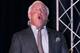 CONCORD, NC - JANUARY 20: Former American Professional Wrestler Ric Flair performs his famous yell 'Wooooo!', for the media during the NASCAR Sprint Media Tour hosted by Charlotte Motor Speedway, held at the Embassy Suites, on January 20, 2010 in Concord, North Carolina. (Photo by Jason Smith/Getty Images)