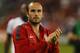 KANSAS CITY, KS - OCTOBER 11: Landon Donovan #10 of the U.S. Men's National Soccer Team celebrates after the victory against Jamaica at Sporting Park on October 11, 2013 in Kansas City, Kansas. (Photo by Kyle Rivas/Getty Images)
