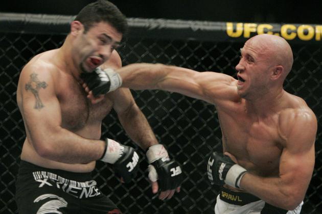 Josh Burkman, right, connects with a punch to Karo Parisyan during the second round of their welterweight bout, Saturday, May 26, 2007, at the MGM Grand Arena in Las Vegas. (AP Photo/Eric Jamison)