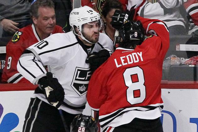 CHICAGO, IL - MAY 21:  Nick Leddy #8 of the Chicago Blackhawks checks Mike Richards #10 of the Los Angeles Kings in the second period of Game Two of the Western Conference Final during the 2014 Stanley Cup Playoffs at United Center on May 21, 2014 in Chicago, Illinois.  (Photo by Tasos Katopodis/Getty Images)
