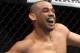 Renan Barao, left, of Brazil celebrates after the official called the fight against Urijah Faber of Sacramento, CA during the first round of the Ultimate Fighting Bantamweight Championship Mixed Martial Arts bout in Newark, N.J. on Saturday, Feb. 1, 2014. Barao won after referee Herb Dean called the fight in the first round. (AP Photo/Tim Larsen)